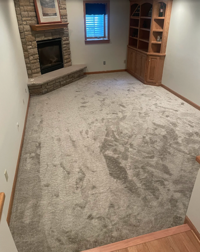 New carpet installation in Hutchinson MN family room with fireplace